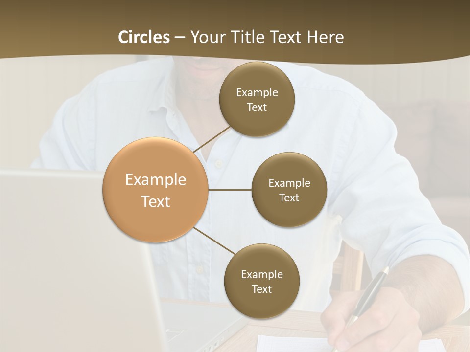 A Man Sitting At A Desk Writing On A Piece Of Paper PowerPoint Template
