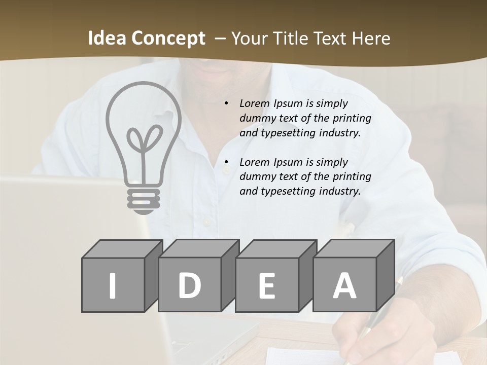 A Man Sitting At A Desk Writing On A Piece Of Paper PowerPoint Template