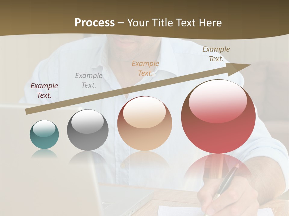 A Man Sitting At A Desk Writing On A Piece Of Paper PowerPoint Template