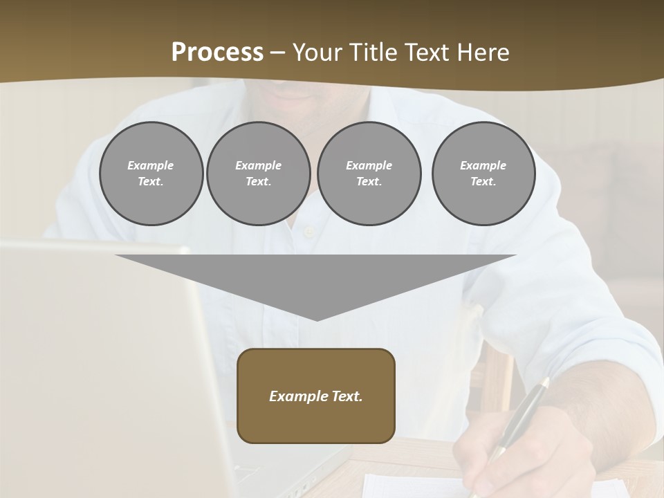 A Man Sitting At A Desk Writing On A Piece Of Paper PowerPoint Template