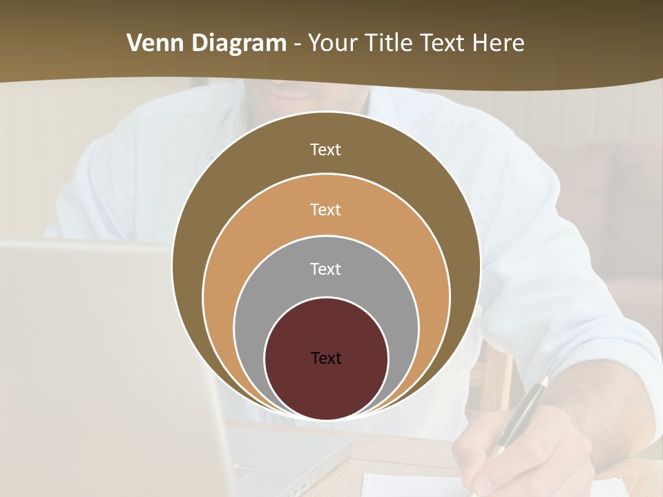 A Man Sitting At A Desk Writing On A Piece Of Paper PowerPoint Template