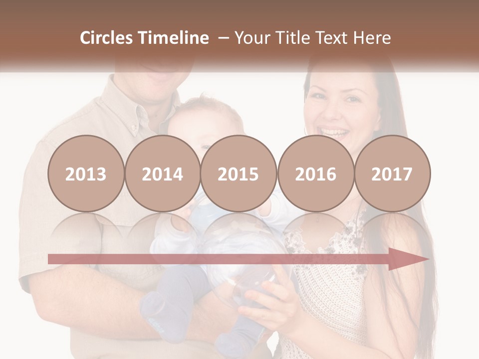 A Man And Woman Holding A Baby In Their Arms PowerPoint Template