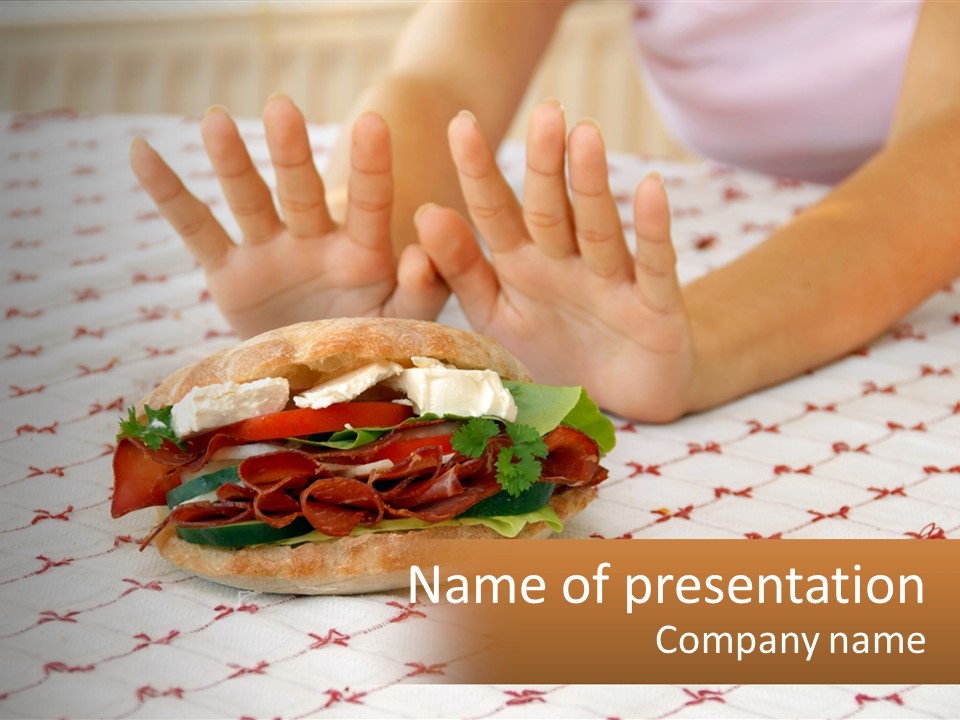 A Person Sitting At A Table With A Sandwich On It PowerPoint Template