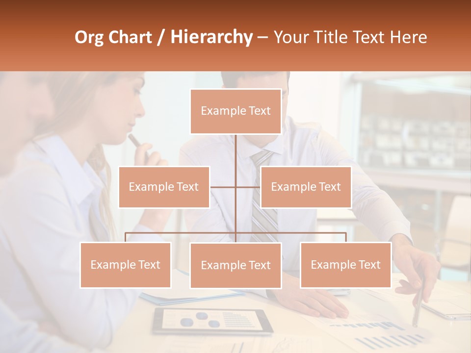 A Couple Of People Sitting At A Table With Papers PowerPoint Template