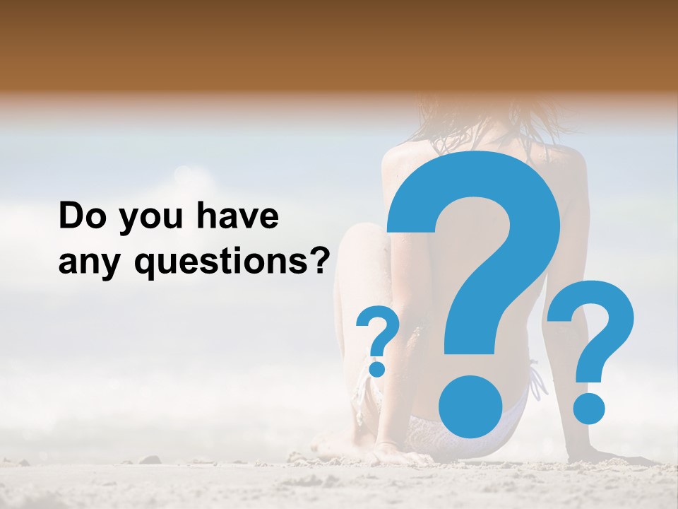 A Woman In A Bikini Sitting On The Beach PowerPoint Template