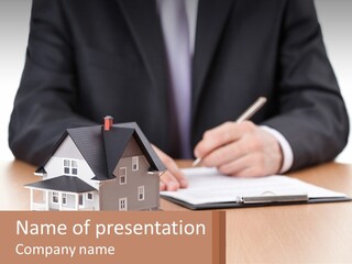 A Man In A Suit Writing On A Piece Of Paper Next To A Model House PowerPoint Template