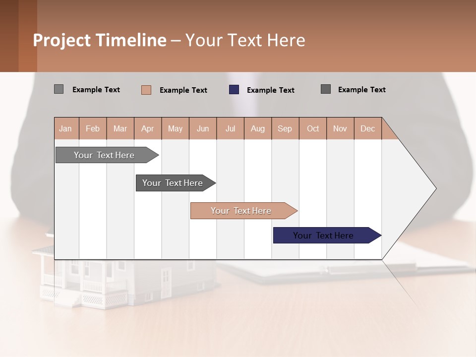 A Man In A Suit Writing On A Piece Of Paper Next To A Model House PowerPoint Template