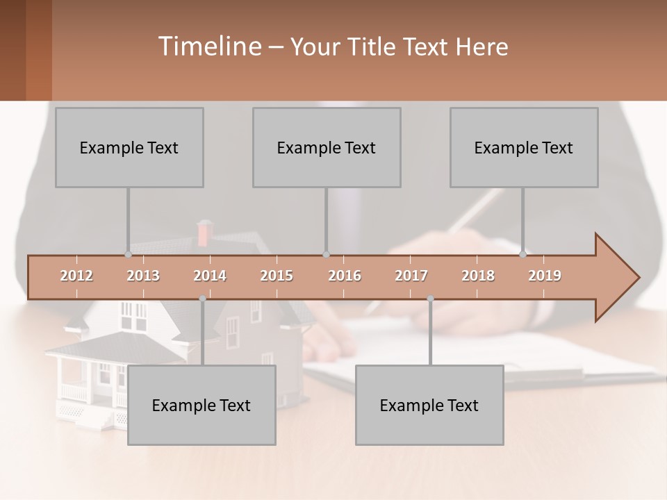 A Man In A Suit Writing On A Piece Of Paper Next To A Model House PowerPoint Template