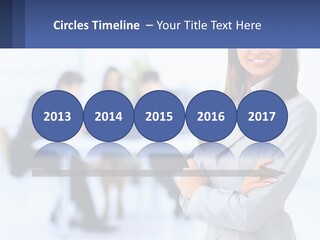 A Woman Standing In Front Of A Group Of People PowerPoint Template