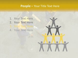 A Group Of Men In Blue And Yellow Work On A Construction Site PowerPoint Template