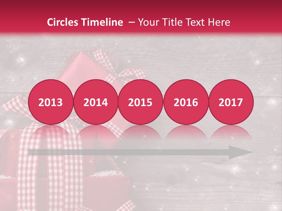 A Red Present Box Sitting On Top Of A Pile Of Snow PowerPoint Template