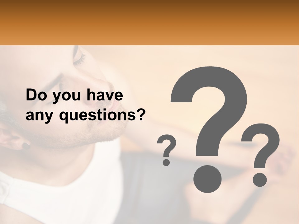 A Man Sitting On The Floor With His Eyes Closed PowerPoint Template