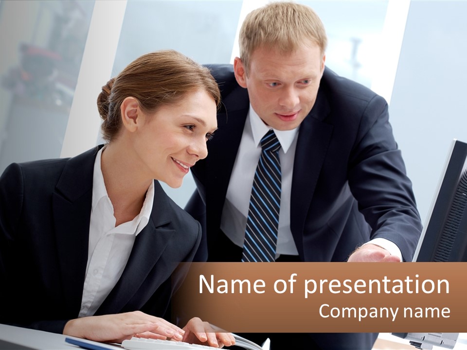 A Man And A Woman Looking At A Computer Screen PowerPoint Template