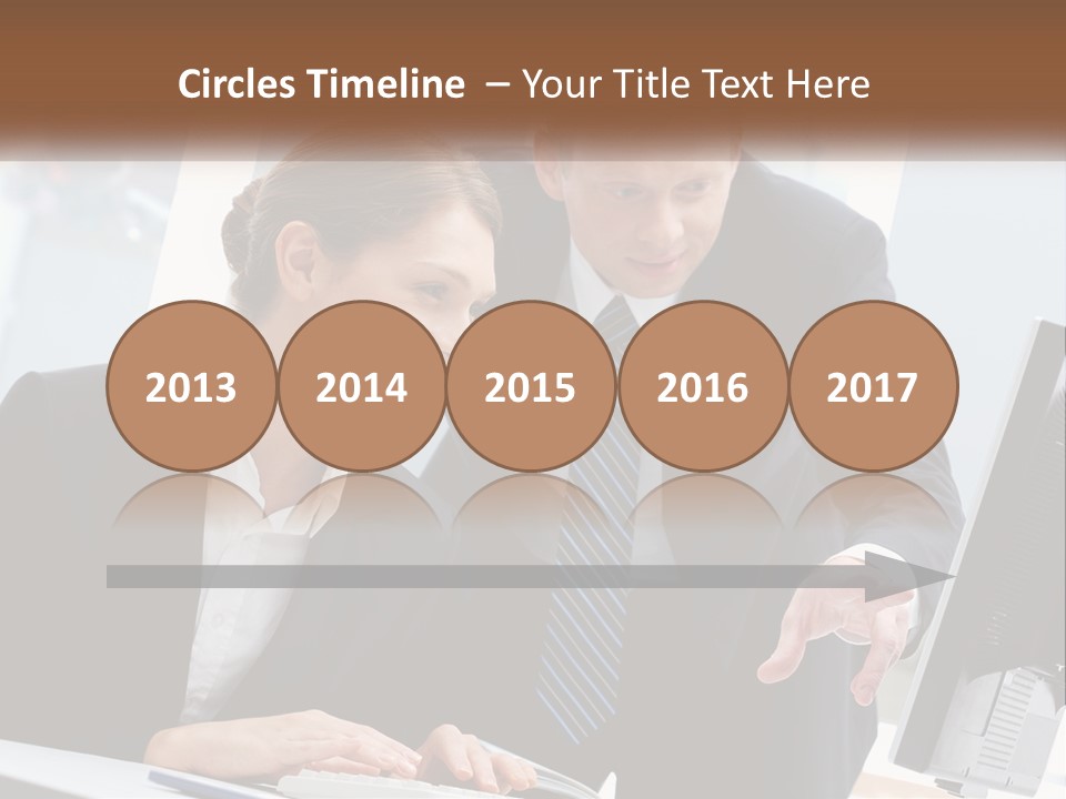 A Man And A Woman Looking At A Computer Screen PowerPoint Template