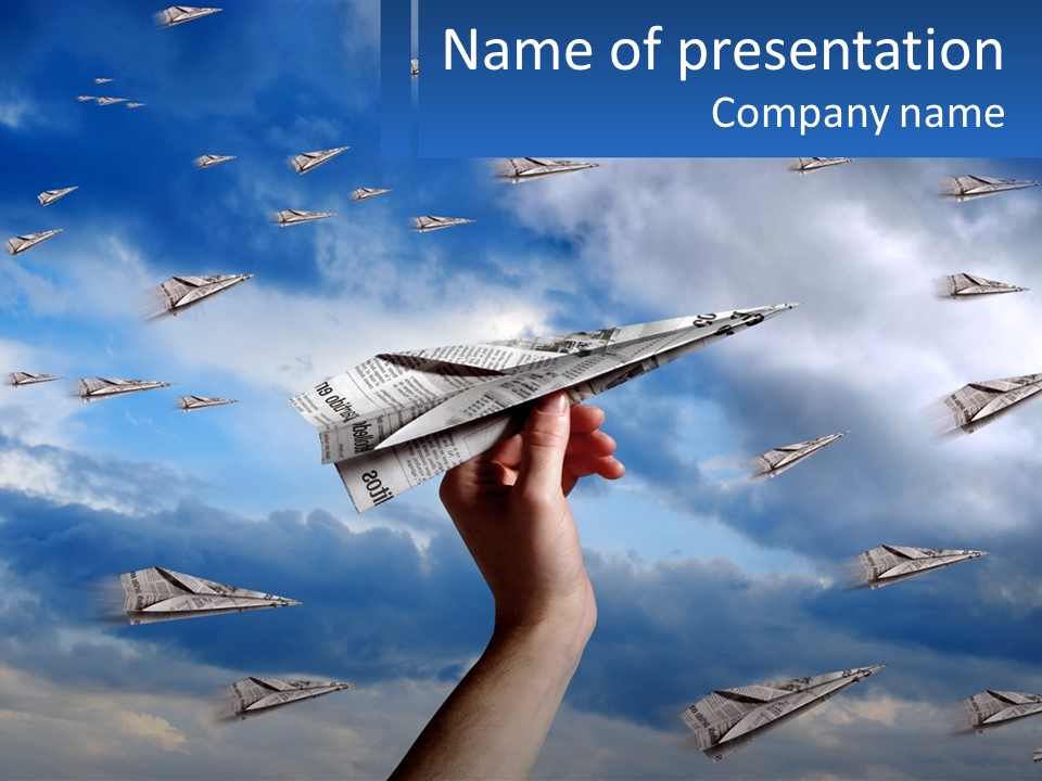 A Hand Holding A Paper Airplane In Front Of A Group Of Planes PowerPoint Template