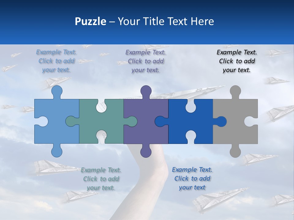 A Hand Holding A Paper Airplane In Front Of A Group Of Planes PowerPoint Template