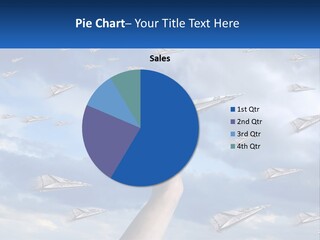 A Hand Holding A Paper Airplane In Front Of A Group Of Planes PowerPoint Template