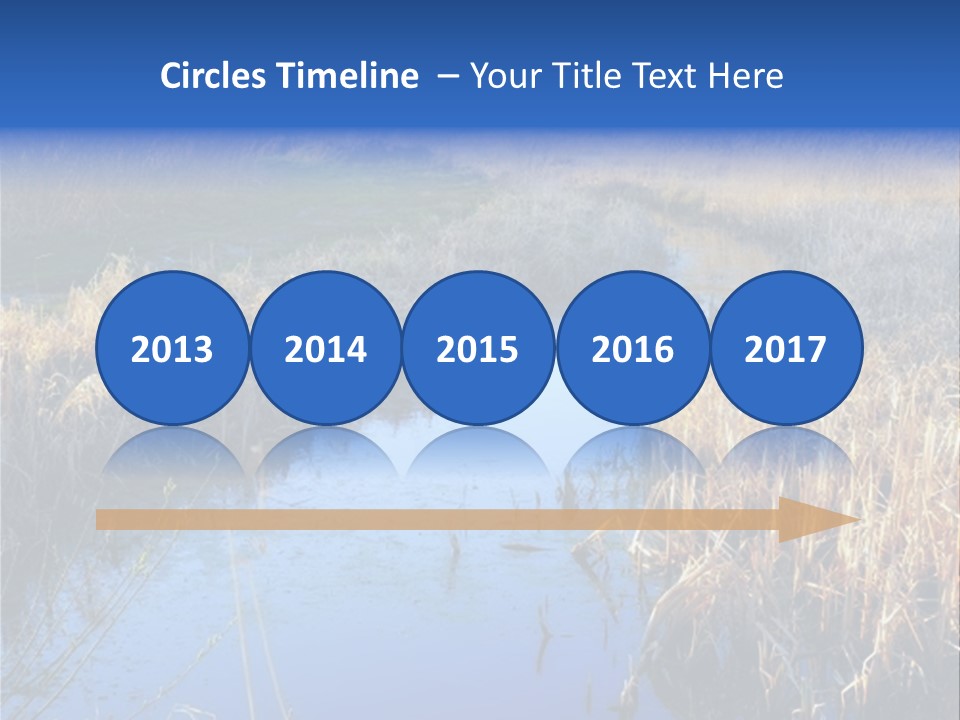 A River In The Middle Of A Grassy Field PowerPoint Template