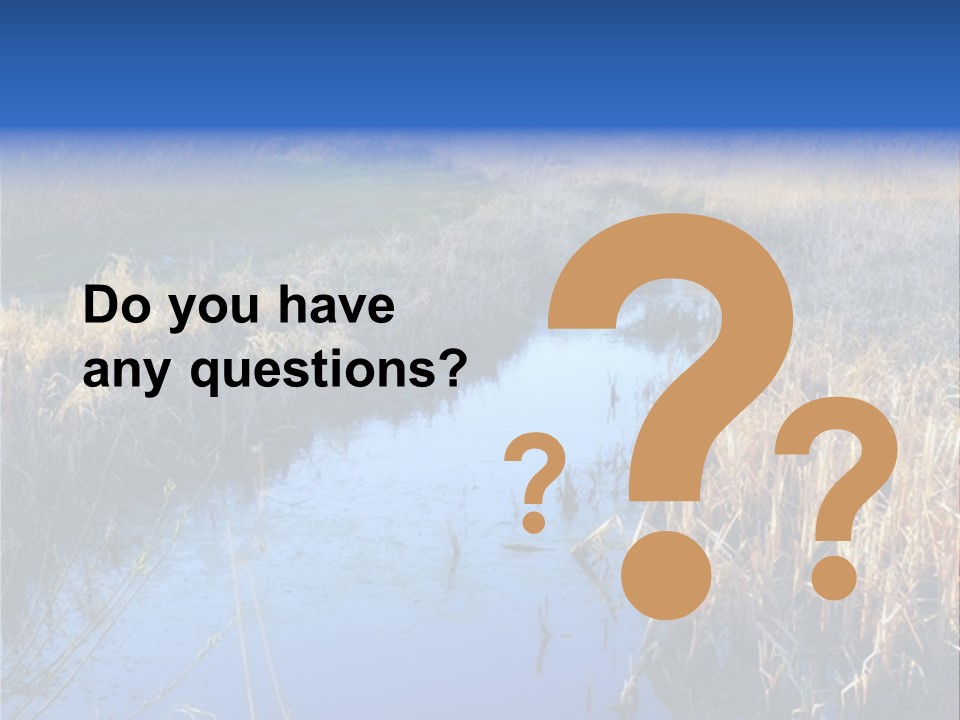 A River In The Middle Of A Grassy Field PowerPoint Template