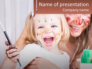 A Woman Holding A Child With Paint All Over Her Face PowerPoint Template