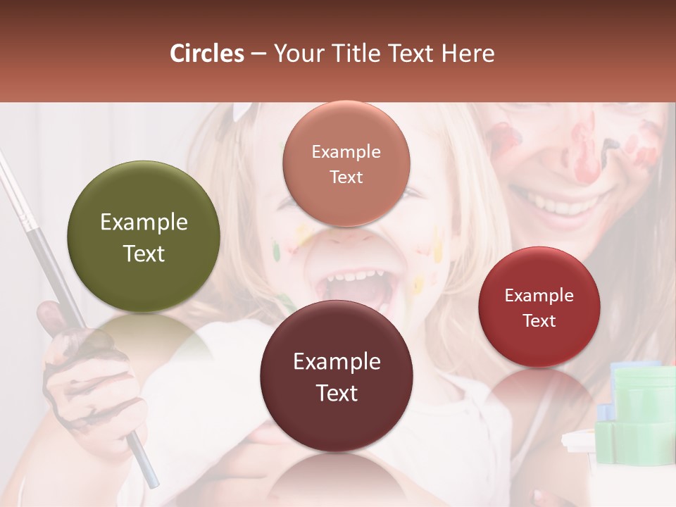 A Woman Holding A Child With Paint All Over Her Face PowerPoint Template