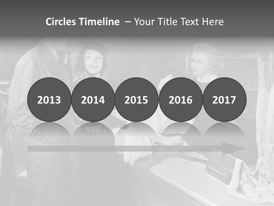 A Man And Two Women Standing In Front Of A Table PowerPoint Template