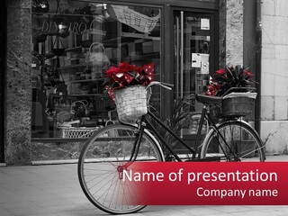 A Black And White Photo Of A Bicycle With Baskets Of Flowers PowerPoint Template