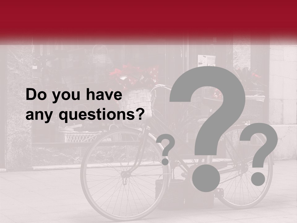 A Black And White Photo Of A Bicycle With Baskets Of Flowers PowerPoint Template