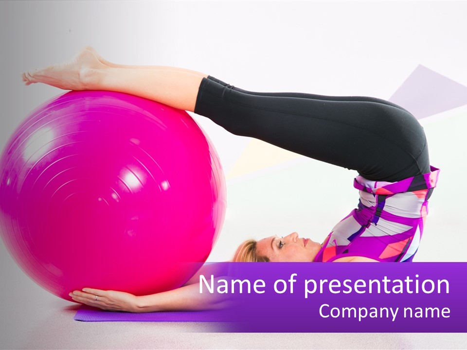A Woman Is Doing A Yoga Pose On An Exercise Ball PowerPoint Template