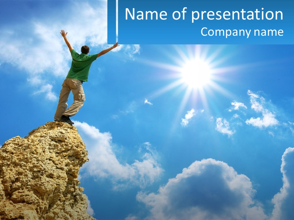 A Man Standing On Top Of A Rock With His Arms In The Air PowerPoint Template