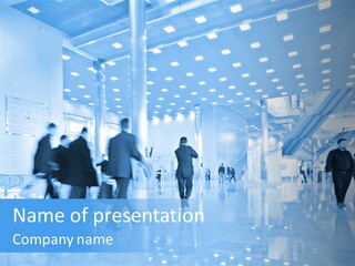 A Group Of People Walking Through A Building PowerPoint Template