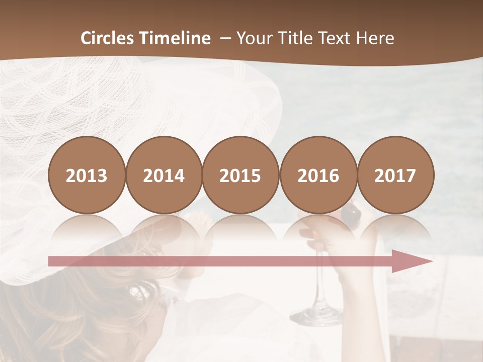 A Woman Sitting In A Chair Holding A Wine Glass PowerPoint Template