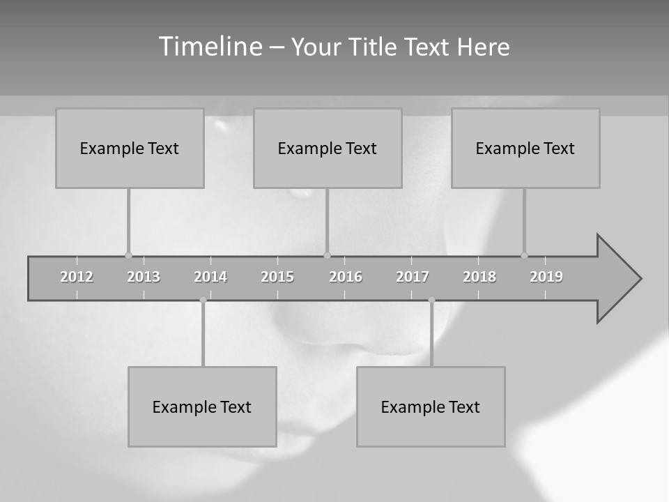 A Young Boy Is Looking Down At His Cell Phone PowerPoint Template