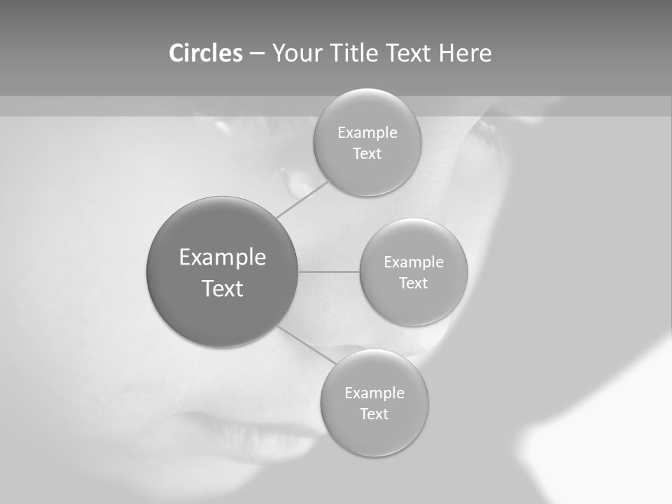 A Young Boy Is Looking Down At His Cell Phone PowerPoint Template