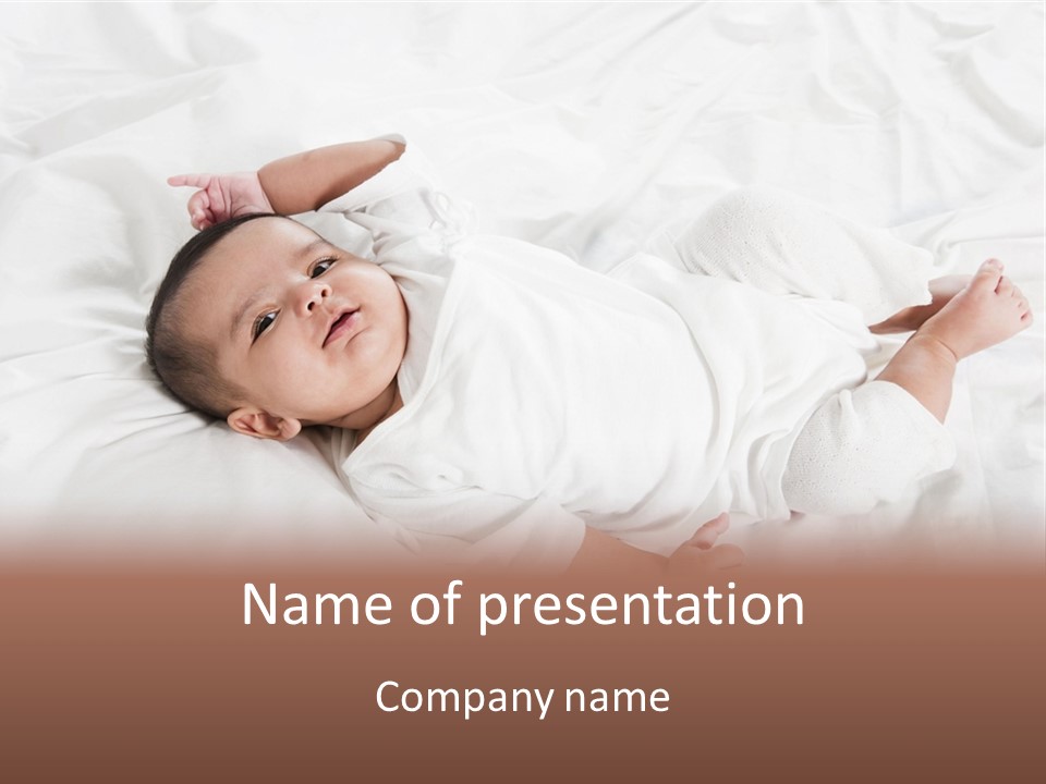 A Baby Laying On Top Of A White Blanket PowerPoint Template