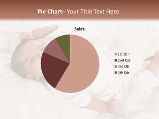 A Baby Laying On Top Of A White Blanket PowerPoint Template