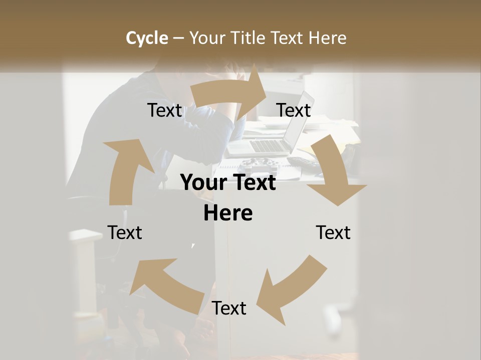 A Man Sitting At A Desk In Front Of A Laptop Computer PowerPoint Template