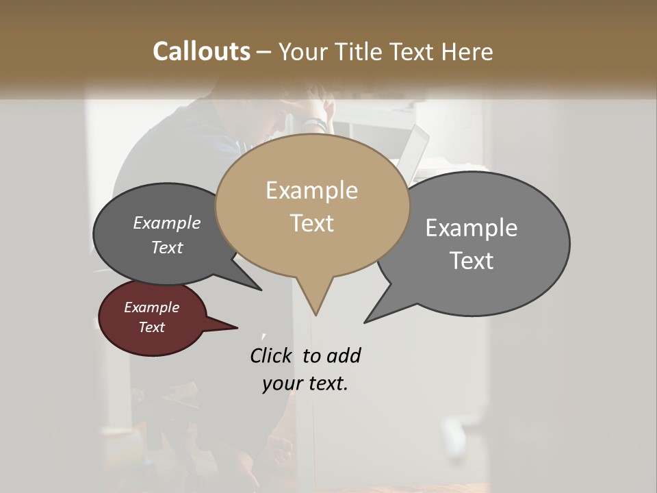 A Man Sitting At A Desk In Front Of A Laptop Computer PowerPoint Template
