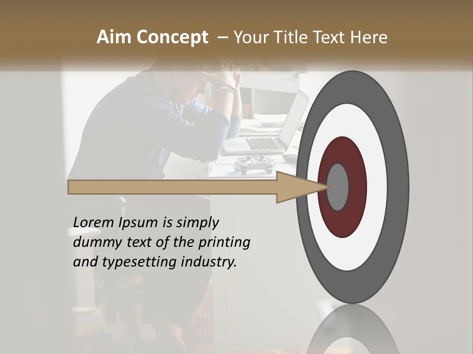 A Man Sitting At A Desk In Front Of A Laptop Computer PowerPoint Template