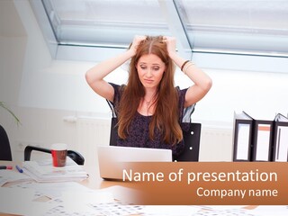 A Woman Sitting At A Desk With A Laptop PowerPoint Template