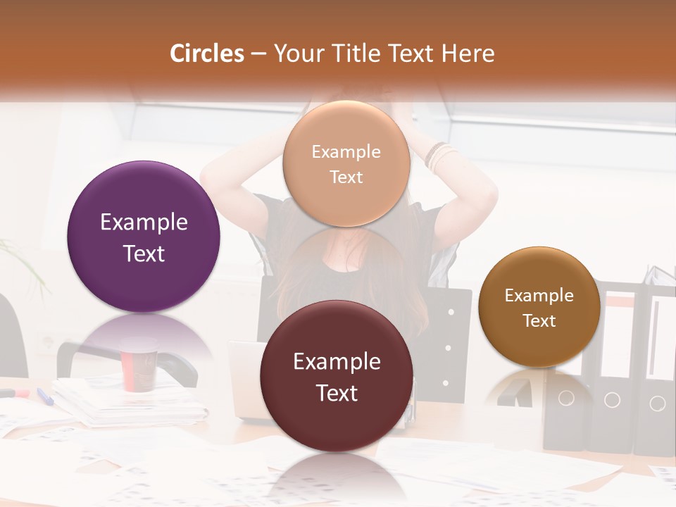 A Woman Sitting At A Desk With A Laptop PowerPoint Template