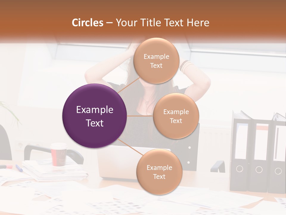 A Woman Sitting At A Desk With A Laptop PowerPoint Template