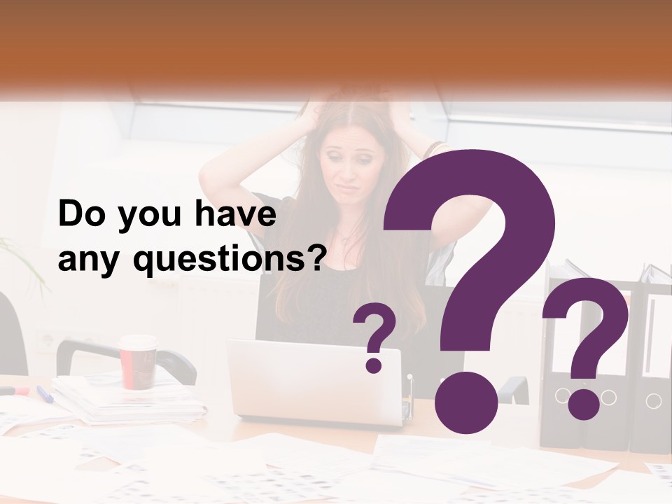 A Woman Sitting At A Desk With A Laptop PowerPoint Template