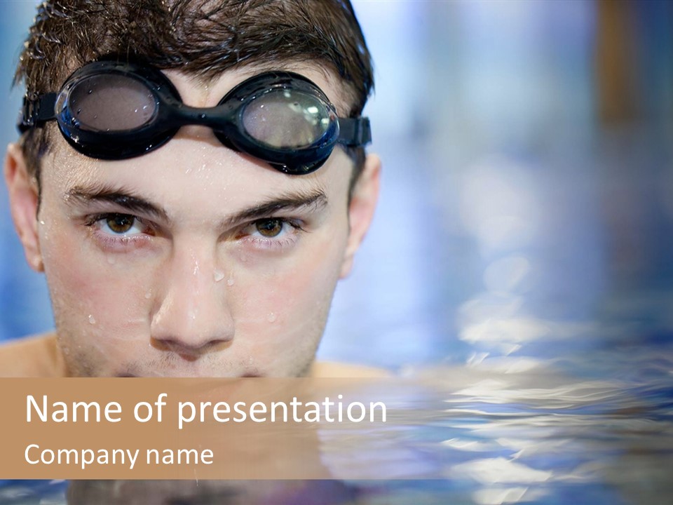 A Young Man Wearing Goggles In A Swimming Pool PowerPoint Template