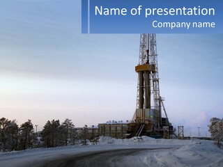 A Drilling Rig In The Middle Of A Snowy Field PowerPoint Template