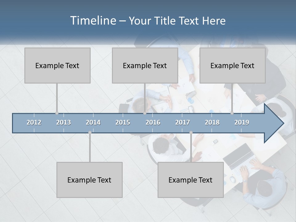 A Group Of People Sitting Around A Table PowerPoint Template
