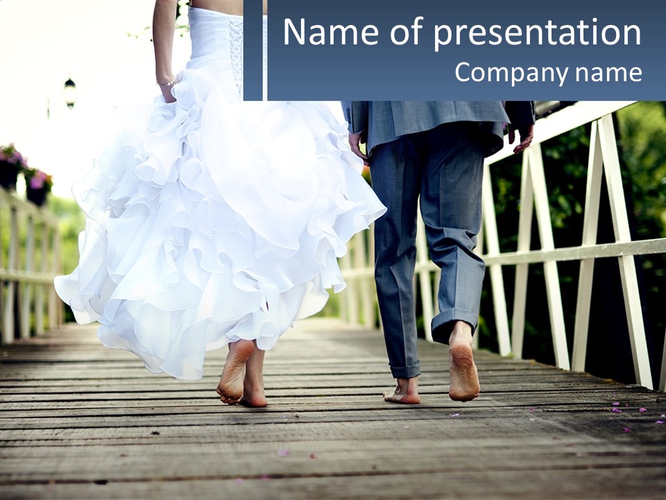A Bride And Groom Walking Across A Bridge PowerPoint Template