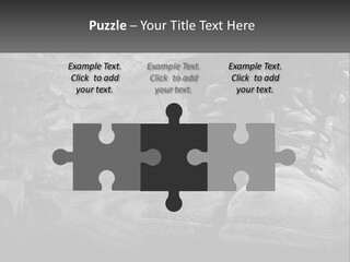 A Black And White Photo Of A Pair Of Boots PowerPoint Template