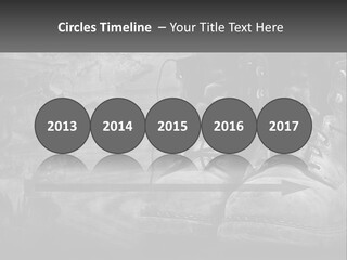 A Black And White Photo Of A Pair Of Boots PowerPoint Template