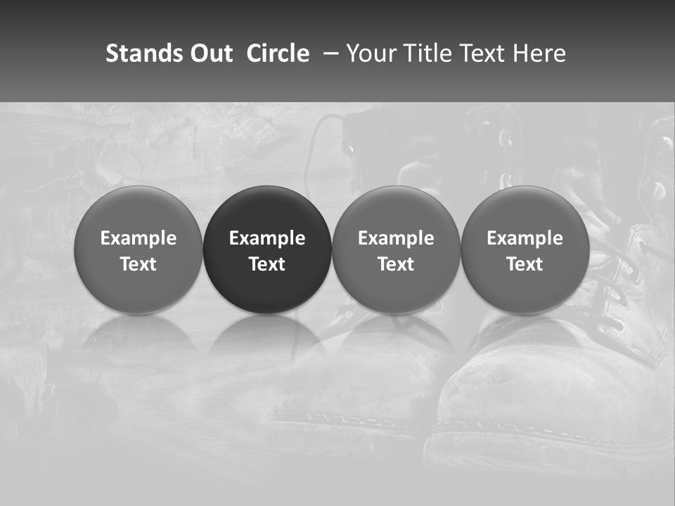A Black And White Photo Of A Pair Of Boots PowerPoint Template